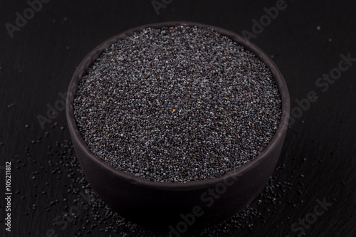 poppy seeds in a stone bowl