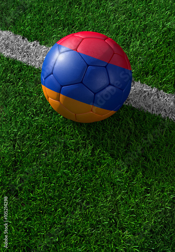 Soccer ball and national flag of Armenia   green grass