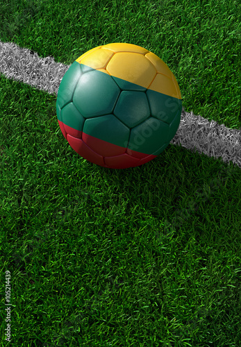 Soccer ball and national flag of Lithuania   green grass