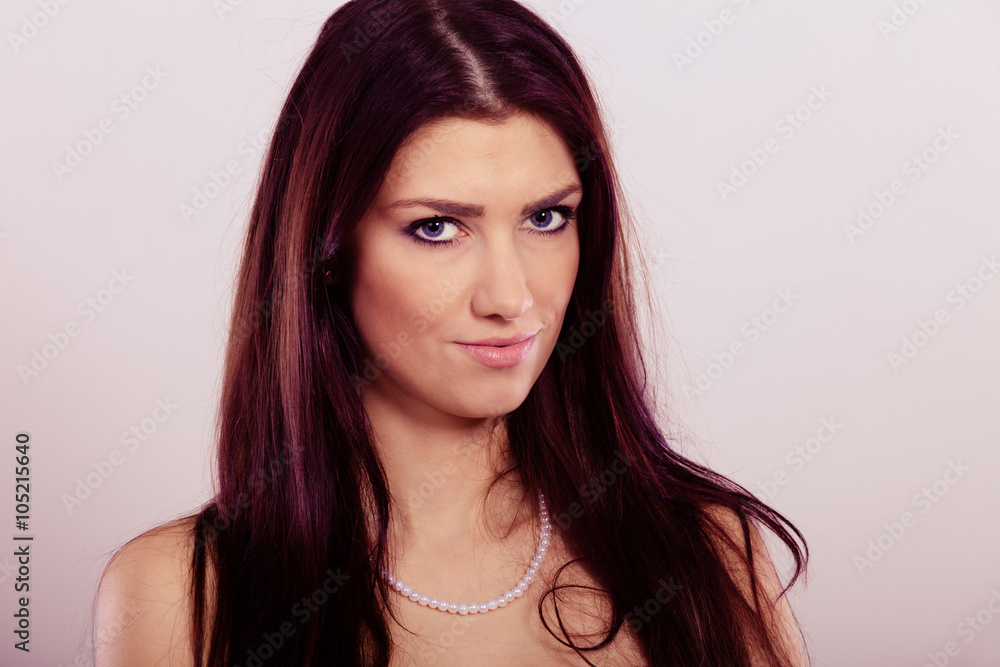 Brunette woman wearing pearls necklace Brunette woman wearing pearls necklace