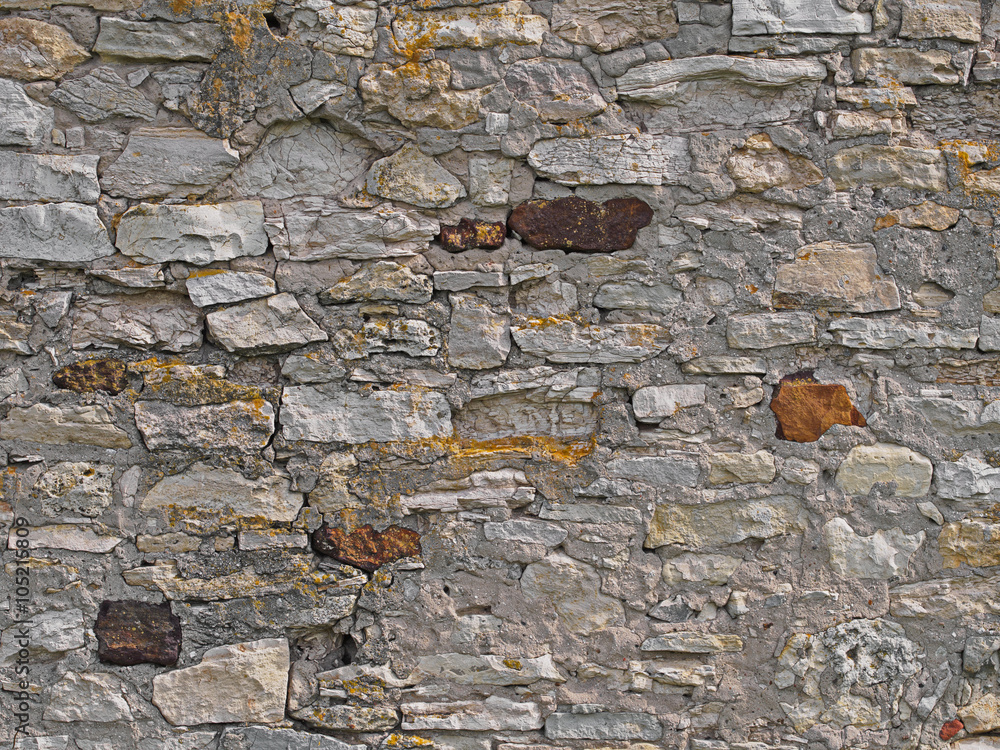 Old brick stone wall background, rural mediterranean stonewall
