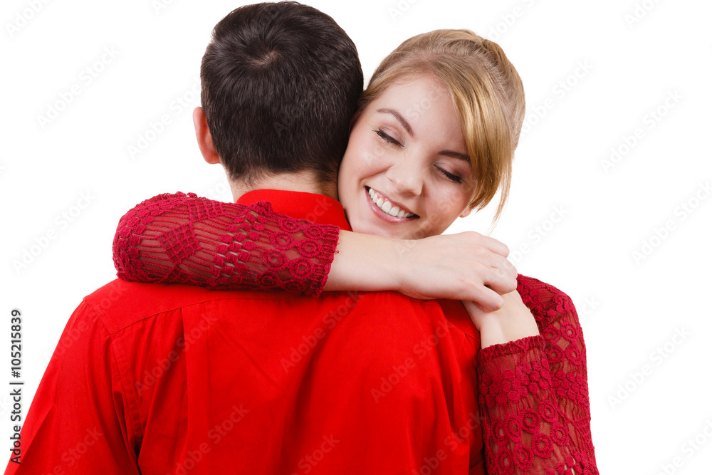 Girl hugging boyfriend romantically. Girl hugging boyfriend romantically.