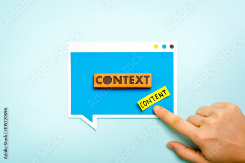 Hand pointing speech bubble with context button and content labe