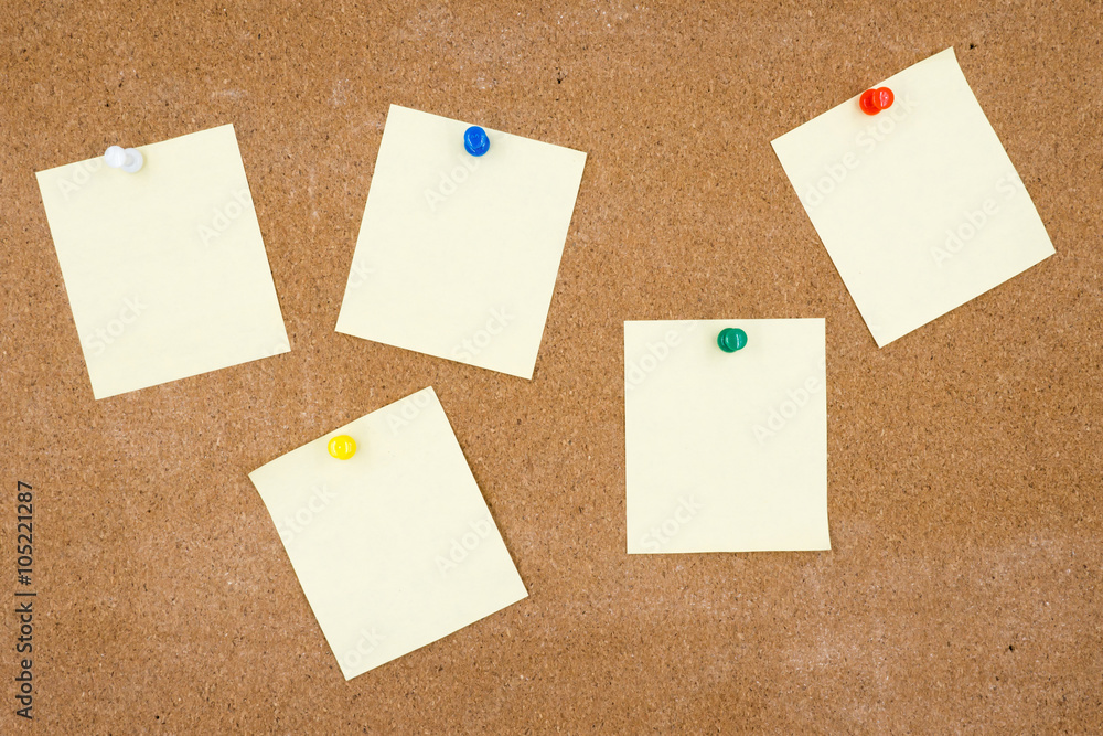 Blank papers pin up on cork board. Blank papers pin up on cork board.