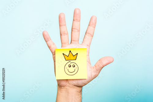 Fotografija Customer is king. Sales and marketing concept. Happy Emoticon.