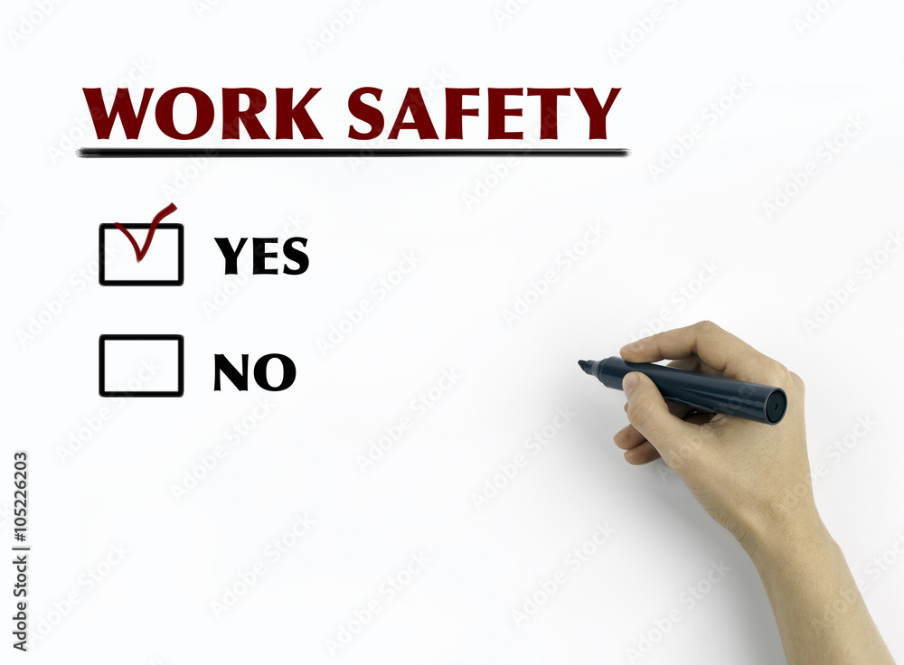 Hand with marker writing: Work Safety