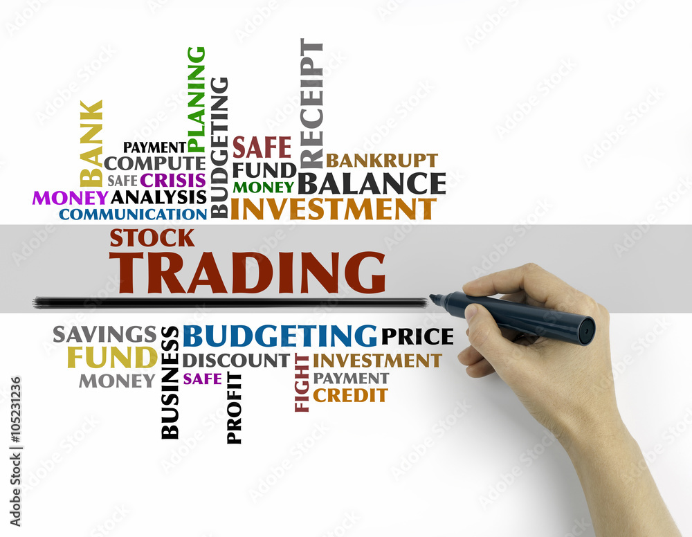 Hand with marker writing - Stock trading word cloud, business co Hand with marker writing - Stock trading word cloud, business co
