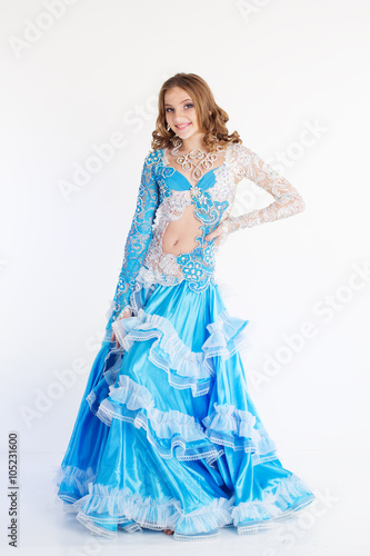 Beautiful teen girl in a blue dress