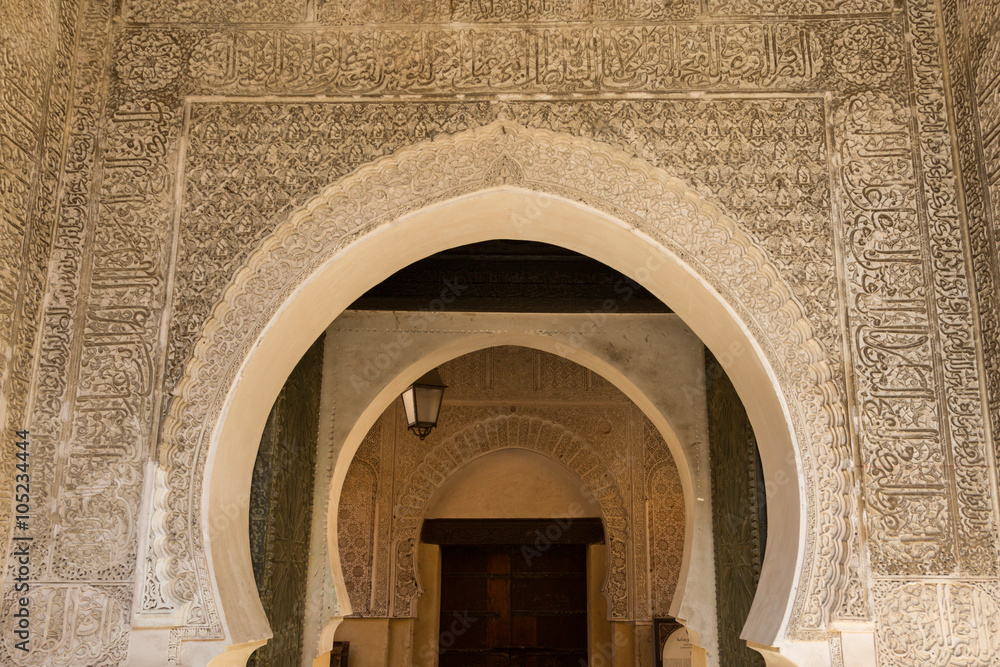 arched entrance to a mosque in the ancient medina of Fes