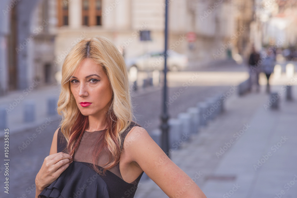 Beautiful young blonde woman in the city Beautiful young blonde woman in the city