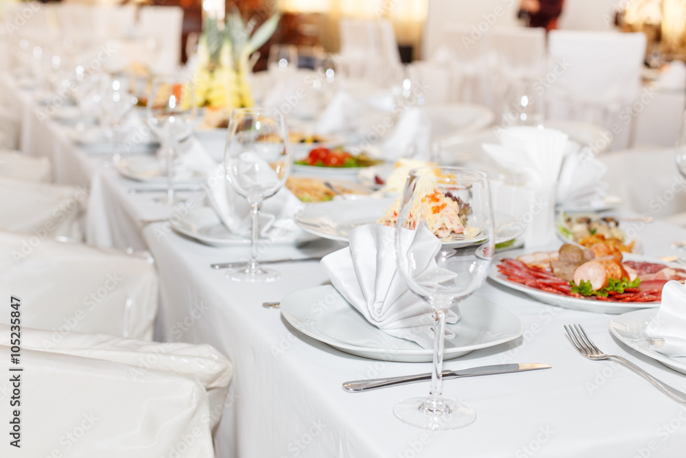 cutlery on the white banquet table cutlery on the white banquet table