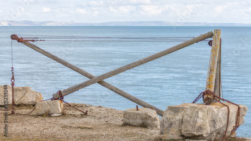 A vintage hand crane at Sandholes on the Isle of Portland originally used by fishermen to move their boats in and out of the sea. 