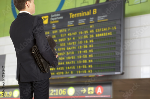 Business trip. Businessman with a briefcase