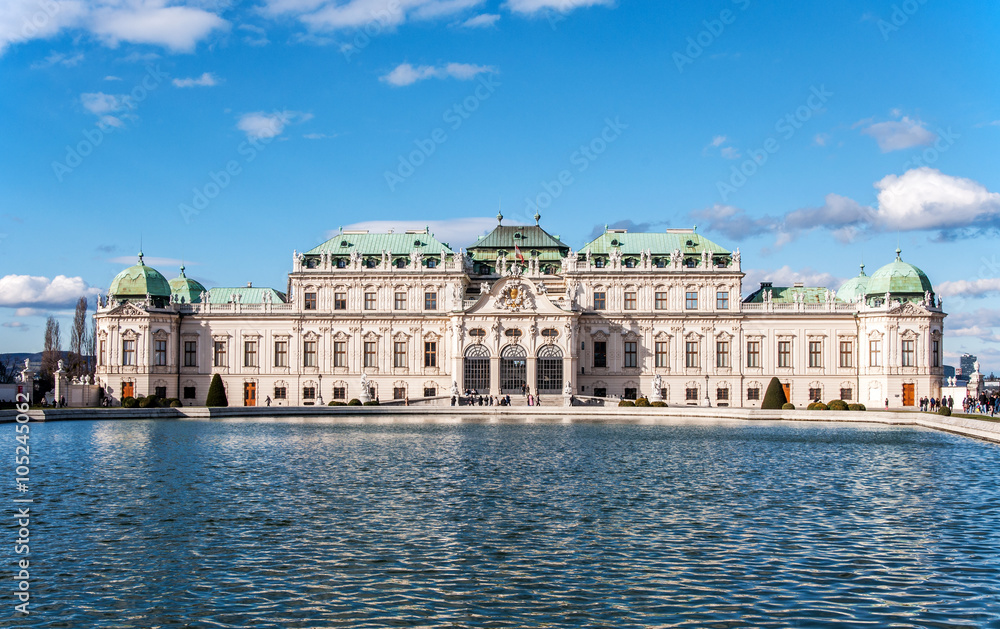 Baroque Belvedere palace in Vienna, Austria, with the pond in sunset light