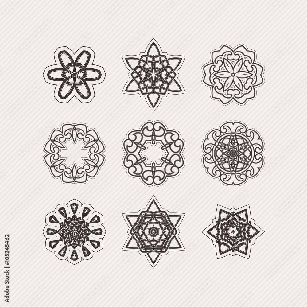 Set of ornate vector mandala symbols. Gothic lace tattoo. Celtic weave with sharp corners. Set of ornate vector mandala symbols. Gothic lace tattoo. Celtic weave with sharp corners.