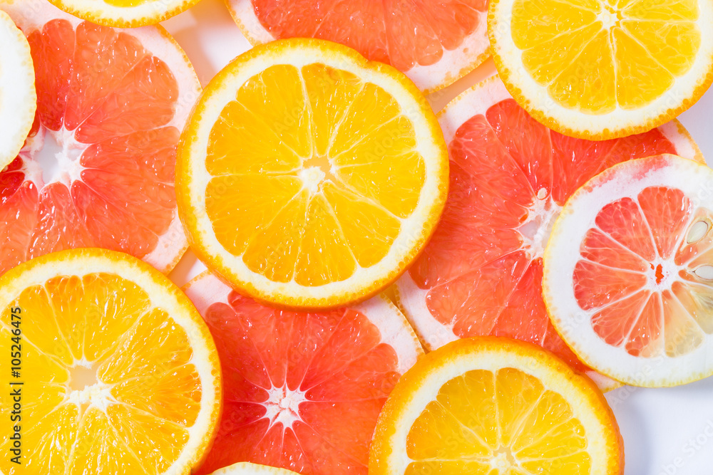 The citrus cut by circles lies on a table The citrus cut by circles lies on a table