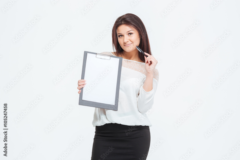 Happy businesswoman showing blank clipboard Happy businesswoman showing blank clipboard