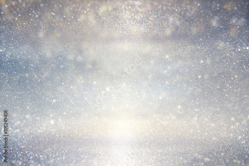 glitter vintage lights background. silver, blue and white. defocused.  © tomertu