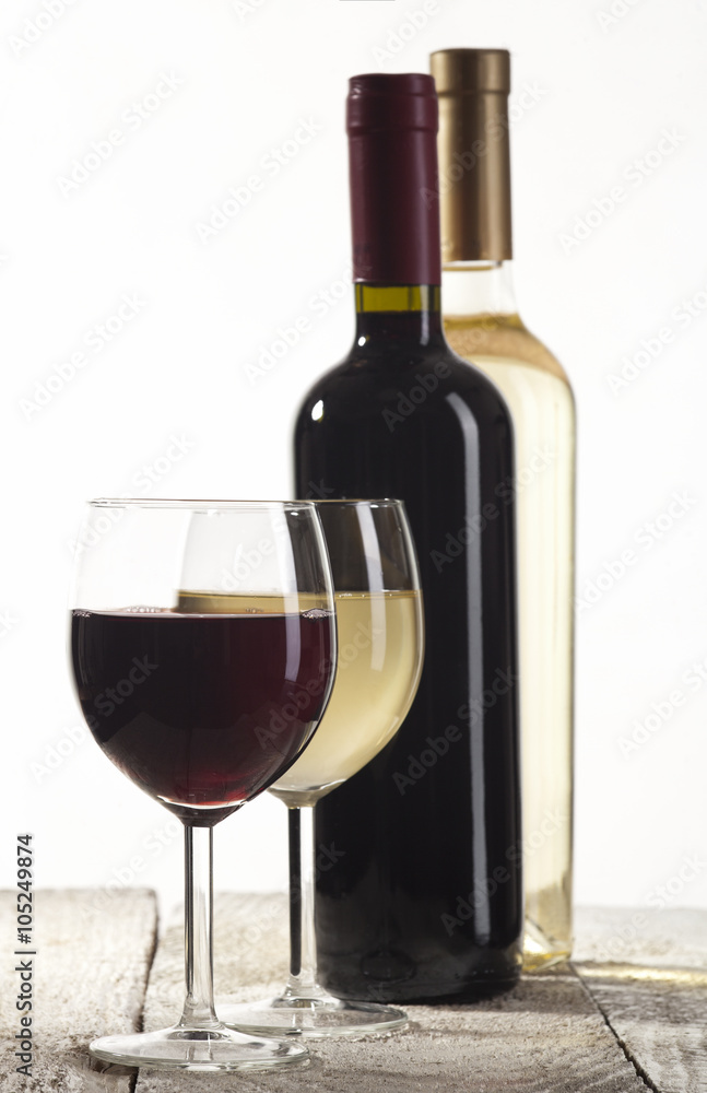 Red and white wine bottles with glasses Red and white wine bottles with glasses