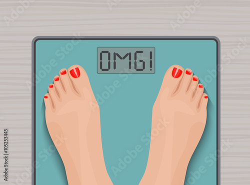 Feet on weighing scales. top view. Health concept.