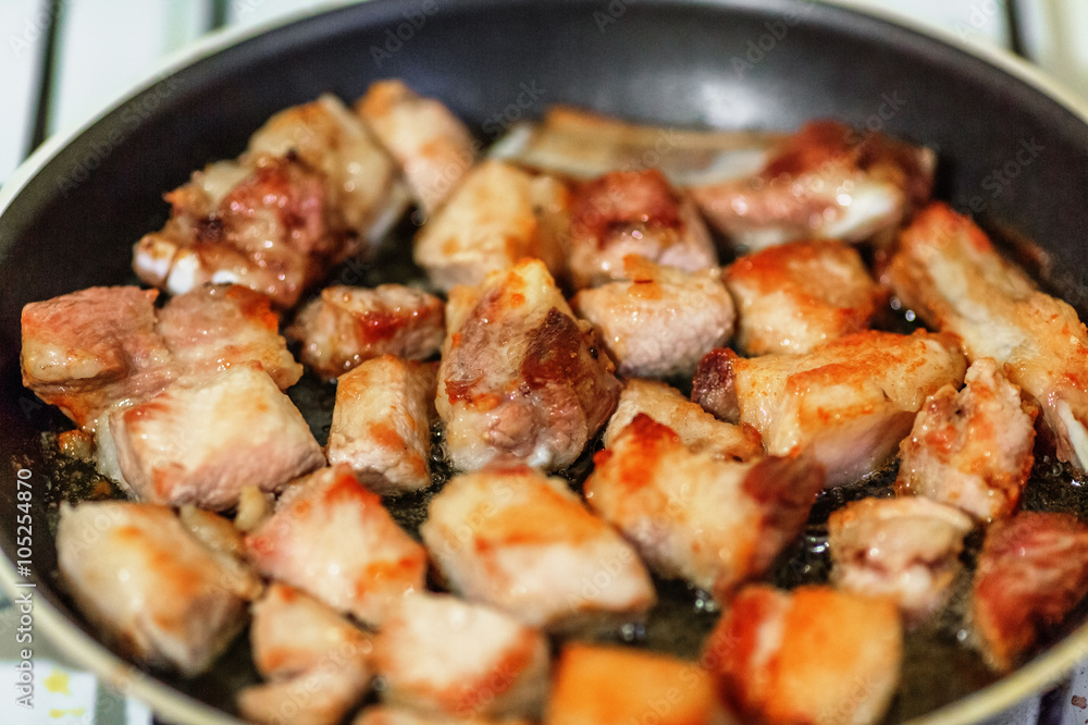 Pork on frying pan