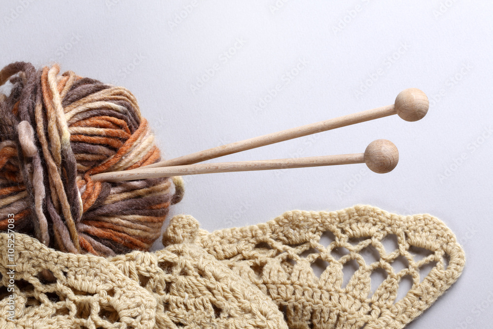 Wool with knitting needle
