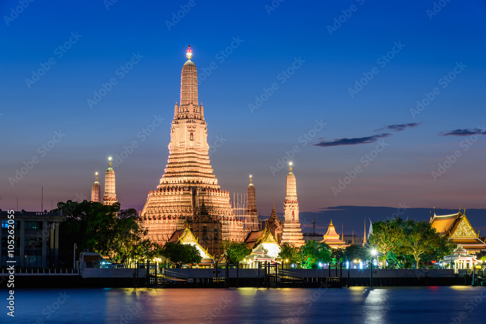Wat Arun Temple at twilight in Bangkok, Thailand. Location in public area. 