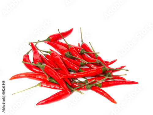 Pods of hot red pepper on a white background