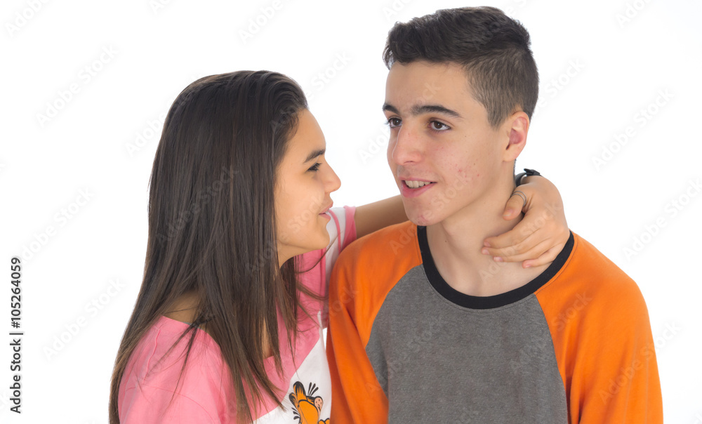 Funny teen couple, smiling newly wake up and dressed in their p Funny teen couple, smiling newly wake up and dressed in their p