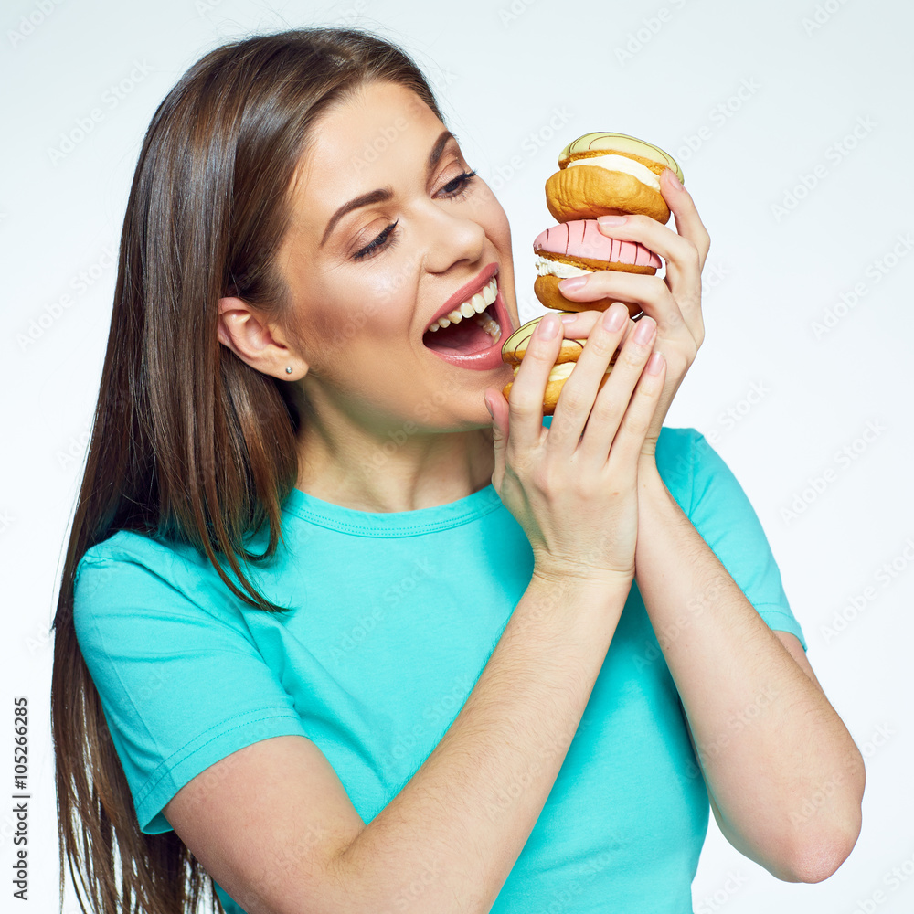 Young woman isolated portrait with cake. Young woman isolated portrait with cake.