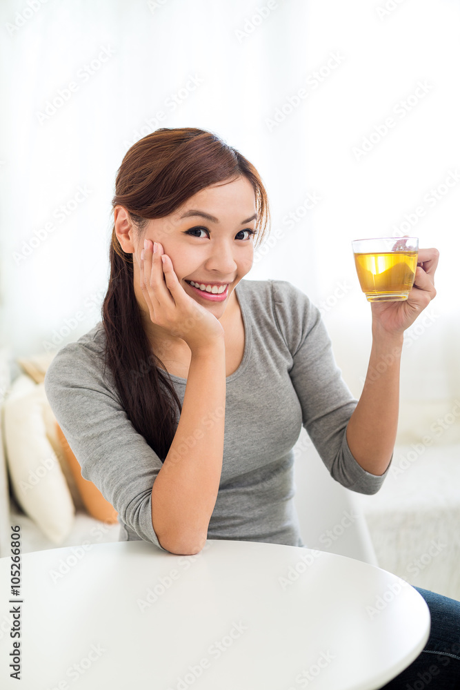 Woman enjoy having tea at home Woman enjoy having tea at home