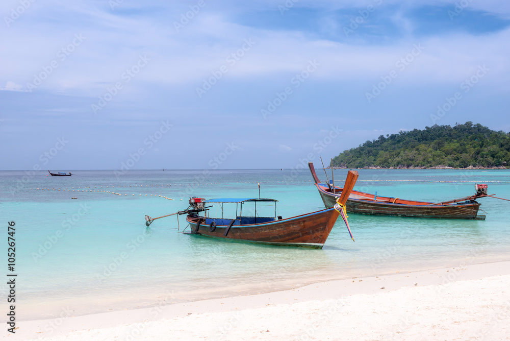 Long-tailed boat on Pattaya beach (Bundhaya) Koh Lipe Thailand Long-tailed boat on Pattaya beach (Bundhaya) Koh Lipe Thailand