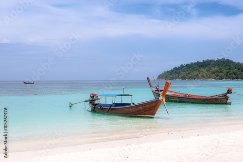 Long-tailed boat on Pattaya beach (Bundhaya) Koh Lipe Thailand