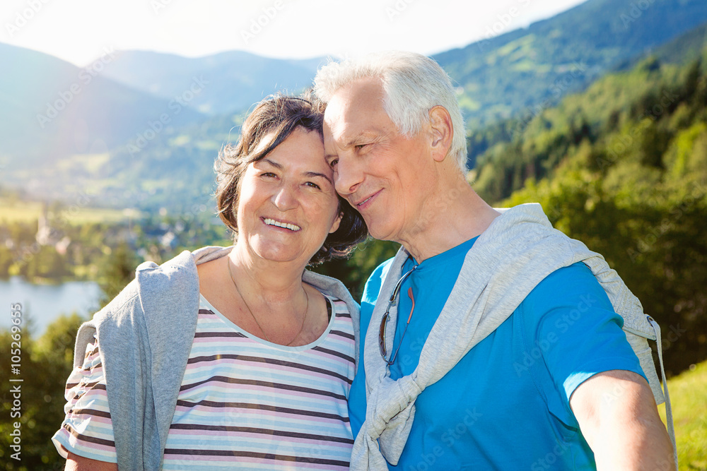 sweet senior couple hugging in nature sweet senior couple hugging in nature