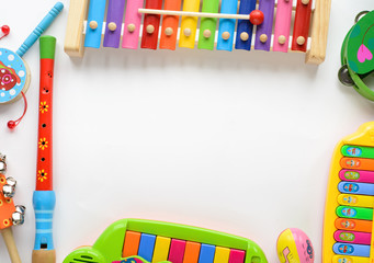  frame made of music accessories for children on white background