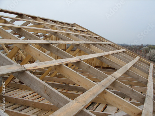 Wooden roof framework of the new house under construction