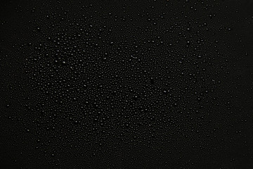 water drops on black background.