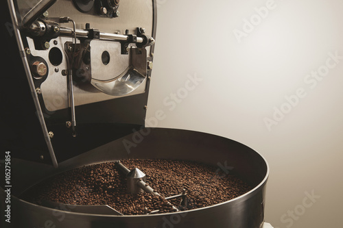 Slika na platnu Freshly baked coffee beans best professional roasting machine