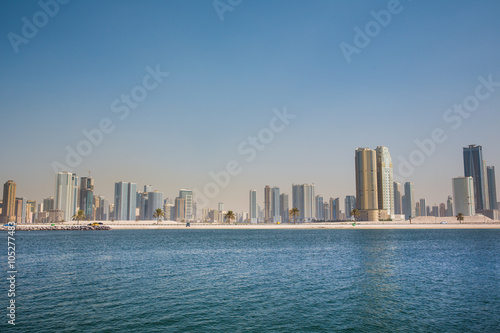 view of the city on the bay. © oleg_mj