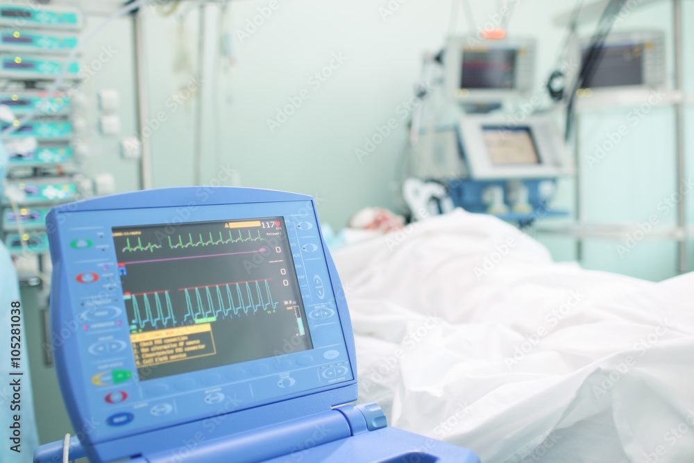 Heart monitor next to the patient's bed Heart monitor next to the patient's bed