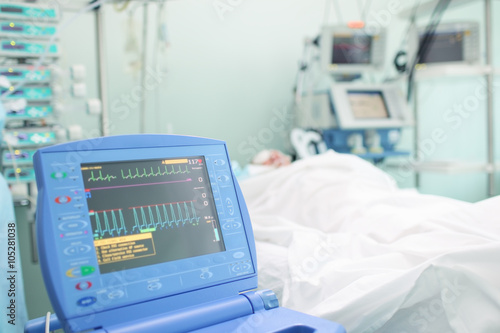 Heart monitor next to the patient's bed photo