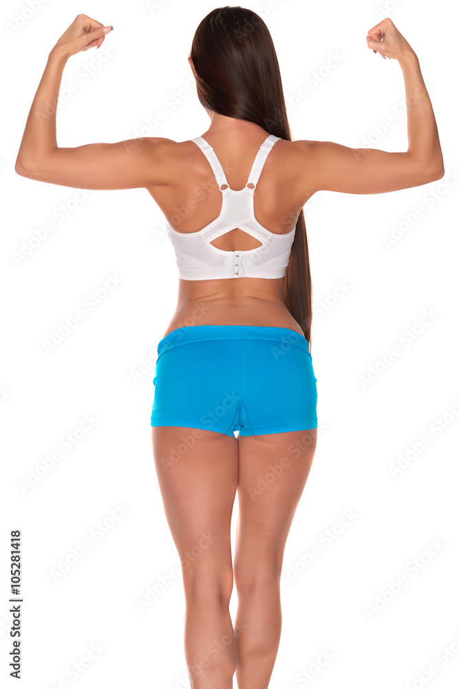 Fitness woman in sport style standing against isolated white background Fitness woman in sport style standing against isolated white background