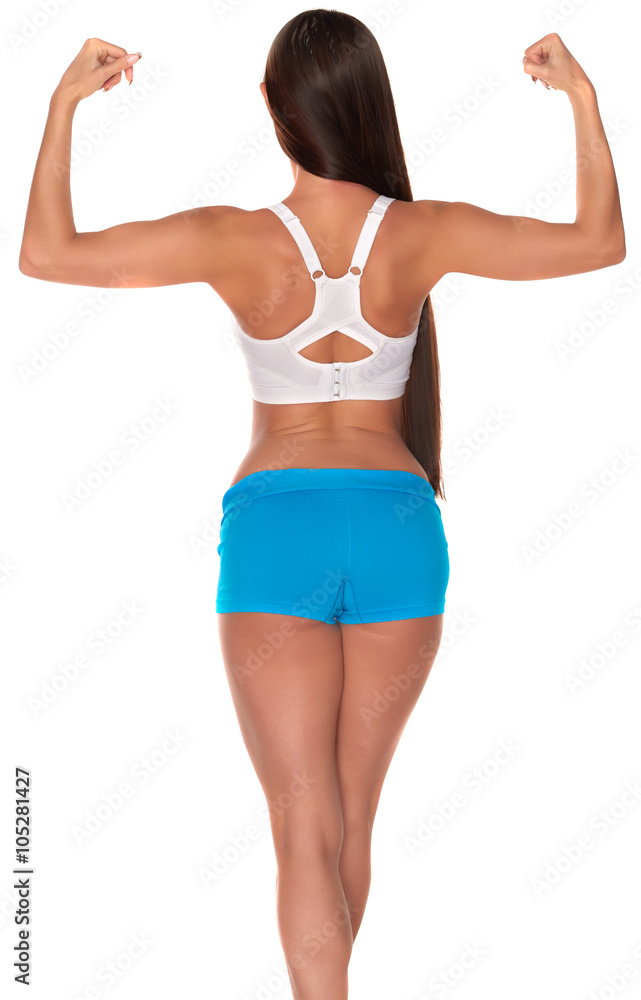 Fitness woman in sport style standing against isolated white background Fitness woman in sport style standing against isolated white background