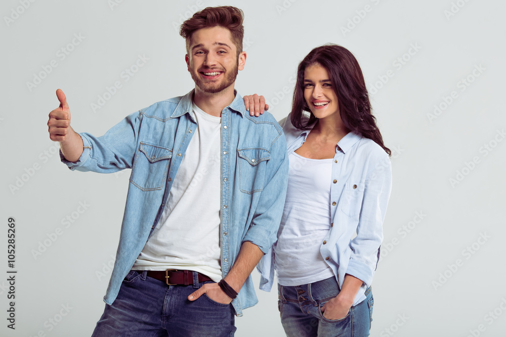 Beautiful young couple in jeans Beautiful young couple in jeans