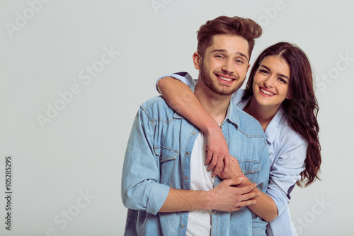 Beautiful young couple in jeans