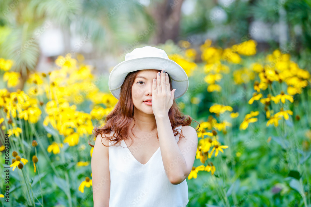 close up portrait of young asian women close her eyes buy her hands, bright colors, positive emotions, cheerful youth concept.