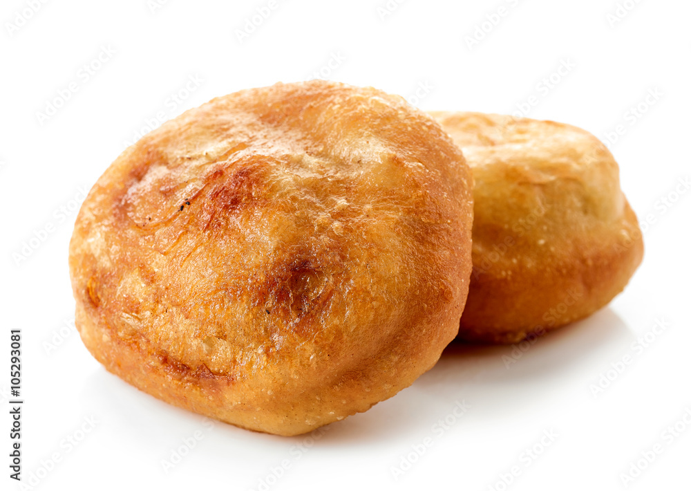 two meat pies belyashi on white background two meat pies belyashi on white background