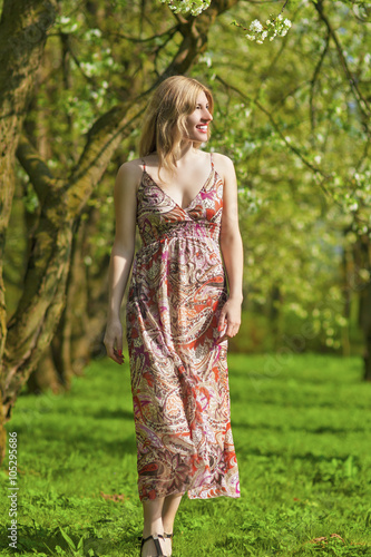Sensual Smiling Blond Lady Enjoying in Spring Forest Outdoors.