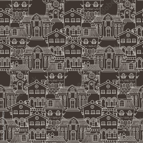 Cute seamless pattern of doodle houses.