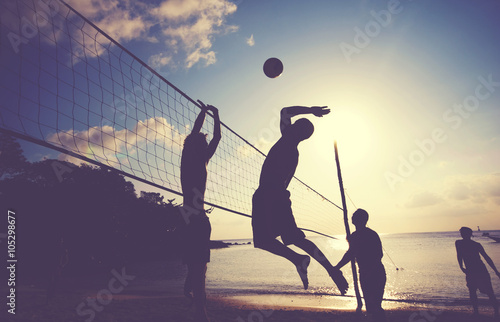 Beach Volleyball at Sunset Enjoyment Concept